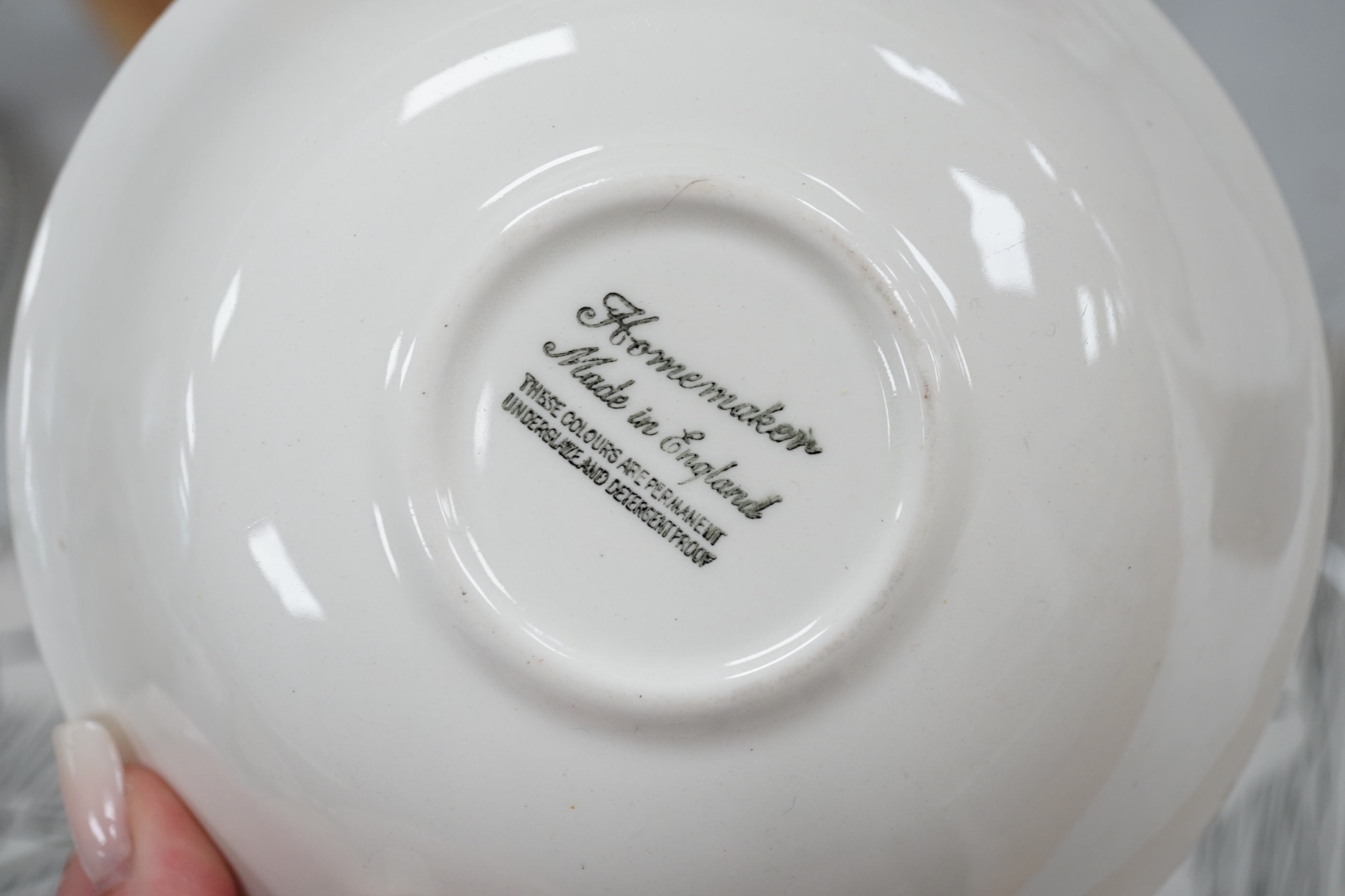 A quantity of Ridgway homemaker retro pottery plates, saucers and bowls, the largest 25cm in diameter